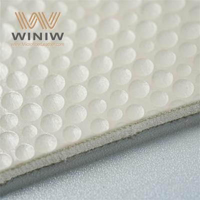 Искусственная кожа с улучшенным сцеплением для профессиональных футбольных мячей