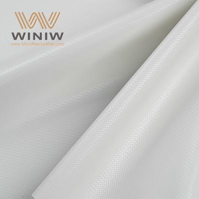 Искусственная кожа из микрофибры с улучшенным контролем мяча для футбольных полей.